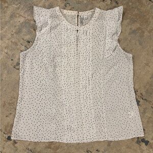 Chiffon sleeveless blouse white with black dots pattern and ruffled shoulders